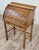 This is a gorgeous antique children’s secretary roll top desk, likely from the early 1900s. Features a functional roll...