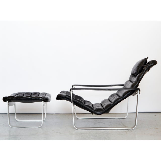 Manufacturer: ASKO Design: Ilmari Lappalainen (1918-2006) Model: Pulkka Condition: Very good condition. The leather shows...