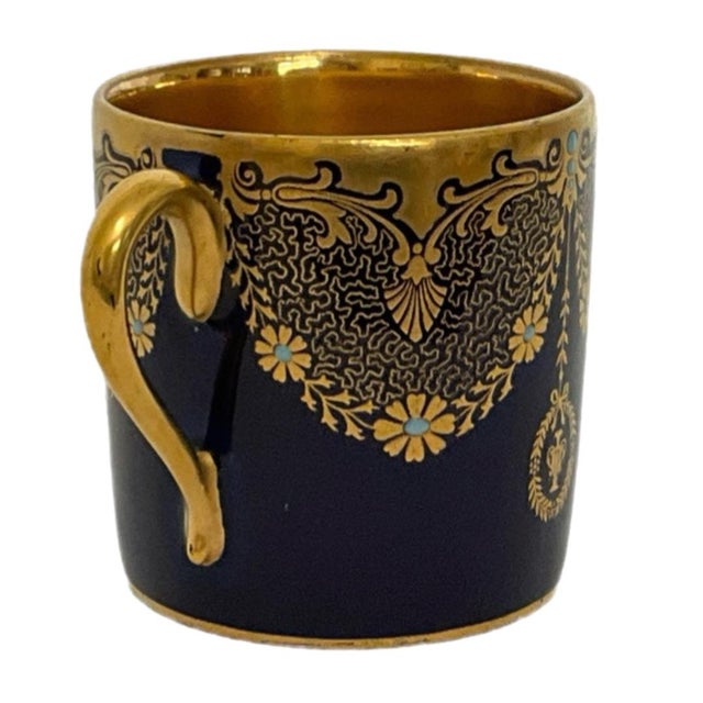Vintage Rosenthal cobalt blue and gold-gilded porcelain demitasse or mocha cup, featuring deep navy-blue ground, gold...