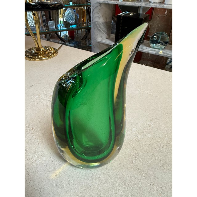 An elegant Murano glass vase designed by Flavio Poli for Seguso, executed in the celebrated sommerso technique and shaped...