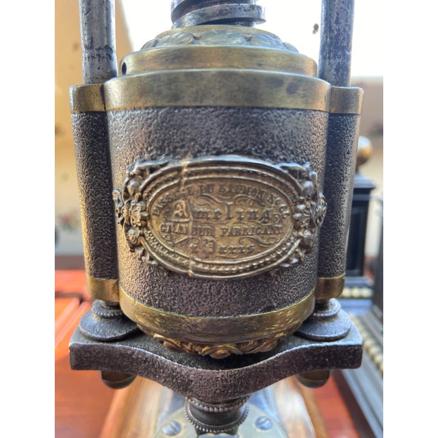 Early 19th Century French antique drill press. Engraved by Auguste Ameling, from a rue Passage du Saumon, considered to be...