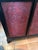 The product is a rare large Asian black lacquer and cinnabar four door server, measuring 70 inches long. This vintage...