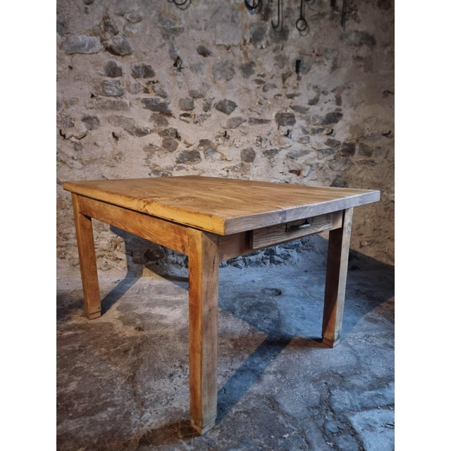 This vintage French baker’s work table dates from the 1960s and is crafted from solid chestnut wood. The table originates...