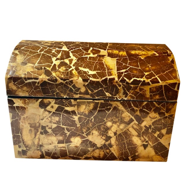 A wonderful 1970s box with a domed top that lifts off, does not have hinges. Black inside it is pieces of horn and paint...