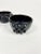 A pair of wonderfully sculptural bowls sculpted and then burnished from the special black clay coming from the state of...