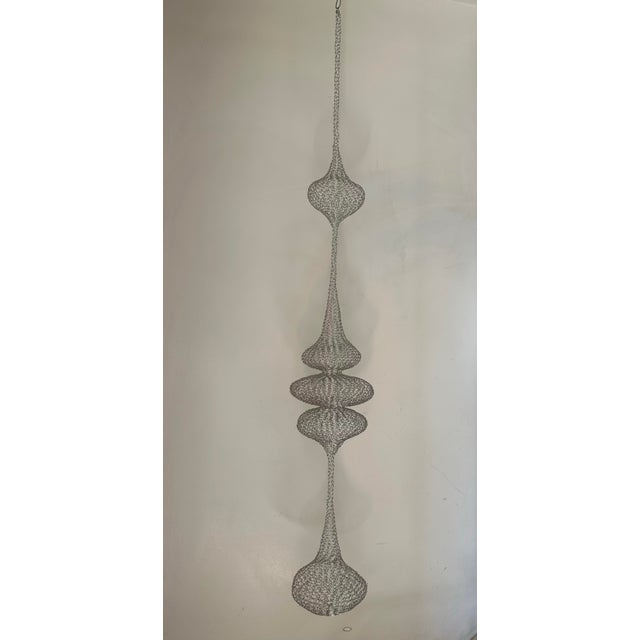 Copper wire sculpture inspired by the handwoven technique of Ruth Asawa.