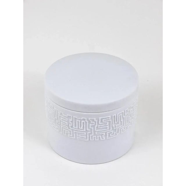 A beautiful white matte relief op-art porcelain vase from the 1960s designed by Cuno Fischer and executed by Rosenthal...