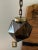 You are looking at a very cool pair of 1960s high style smoked glass gem fixtures with darkened brass fitting and chain....