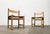 Three chairs of Swedish origin in the safari style. The frame consists of solid wood elements that come together here in...