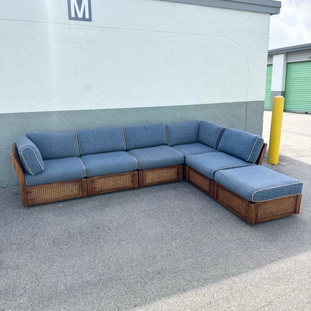 Side piece: 26.5”w, 30”d. 25.5”h Corner piece: 31”w, 30”d, 25.5”h Ottoman: 26.5”w, 26.5”d. 16”h A rare vintage boho chic...