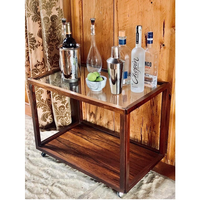 Exquisite expert carpentry work on this rare Brazilian Rosewood, also known as Jacaranda, rolling bar cart/coffee, side...