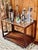Exquisite expert carpentry work on this rare Brazilian Rosewood, also known as Jacaranda, rolling bar cart/coffee, side...