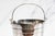 A charming example of early twentieth-century English barware, this circa 1905 silverplate ice bucket is an outstanding...