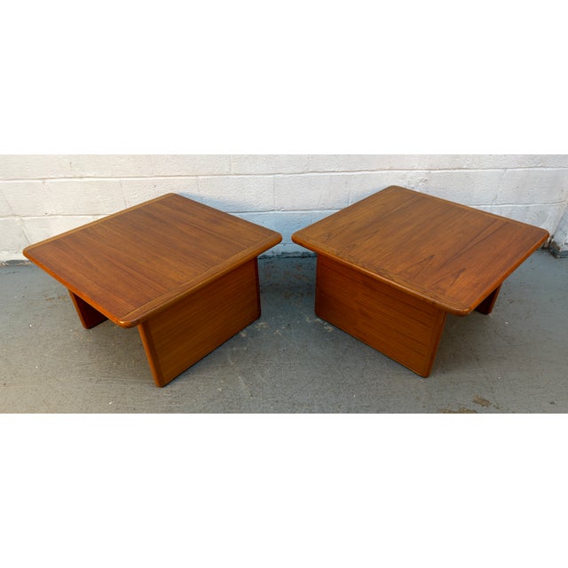 Pair of vintage mid-century modern teak end tables, expertly crafted in Denmark by the renowned Vildbjerg Møbelfabrik....