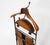 A wonderful, impeccably English deluxe valet stand with trouser press. Circa 1920's. Labelled 'Watt Cam Tourist' and 'The...
