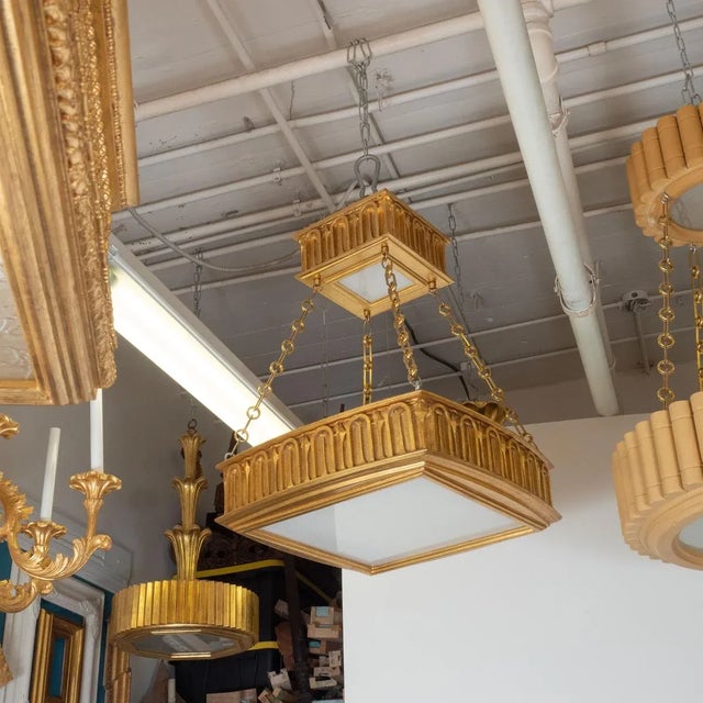 22k gold giltwood two-tier pendant by master woodworker Carlos Villegas.