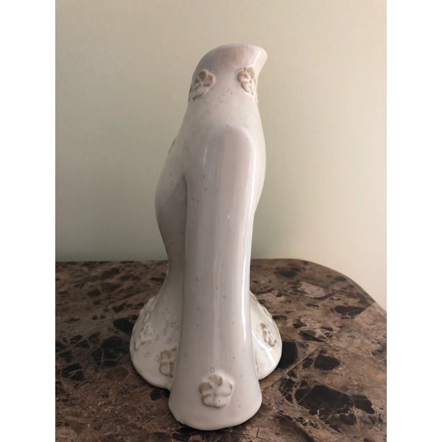 Very unique ceramic glazed female bust wearing an elegant high jacket. The angled collar is the opening of the vase. Base...