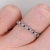 This eternity band ring in solid 14K gold features blue sapphires with milgrain details extended all the way around the...