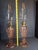 Presenting a stunning, authentic matching pair of vintage pink pressed glass kerosene lamps. These elegant lamps feature a...