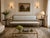 A French Louis XVI-style giltwood settee featuring elegant neoclassical lines, finely carved details, and a beautifully...