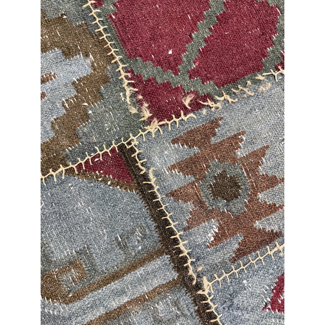 Design Plus Gallery presents a Vintage 4ft × 5ft11in Patchwork Kilim Rug. Sewing together cultures, traditions and history...