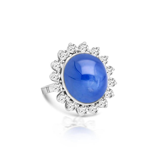 Natural 30 Carat no Heat Ceylon Blue Star Sapphire & Diamond Ring In Platinum This unheated star sapphire ring boasts a 30...