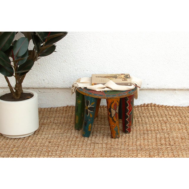 A unique piece of African art, this vintage Nupe table from Nigeria is a must-have for collectors and enthusiasts of Nupe...