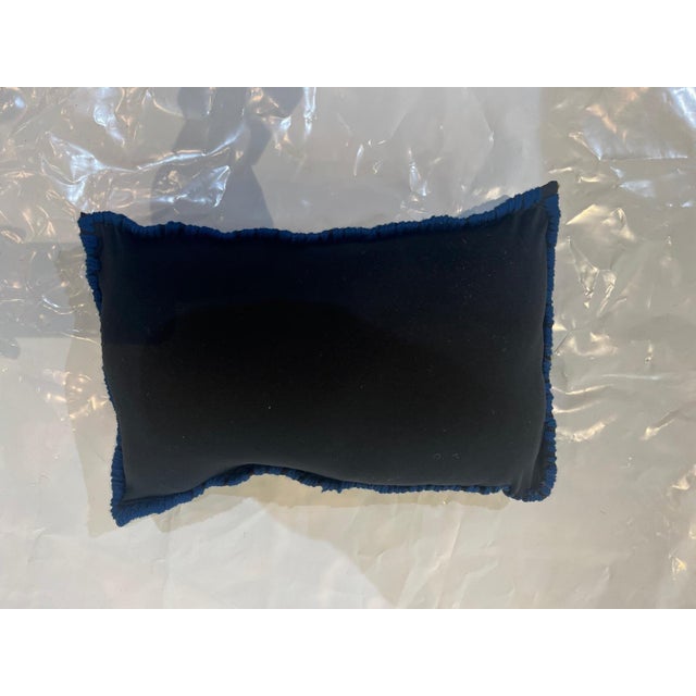 Pillow made with genuine hand made antique Persian rug fragment-poly fill with fabric backing , sewn closure-