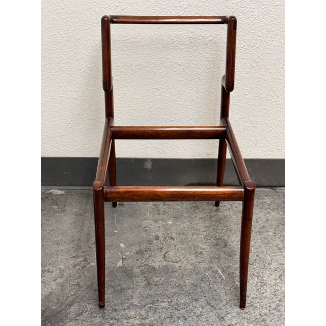 Design Plus Gallery presents a Rare Mid-Century Open Wood Lounge Chair Frame, Circa 1954. This chair frame has an...