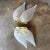 Beautiful 1950's mid-century frosted glass leaf sconces on brass wall mounts. Each leaf can swivel to your desired...