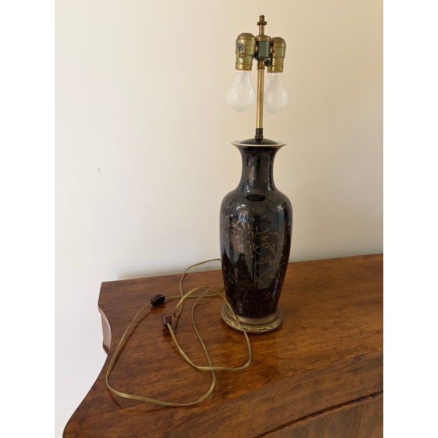 Treasured vintage 27”H table lamp with 6”diameter black/gold painted porcelain base and 12”H x 19”diameter soft...