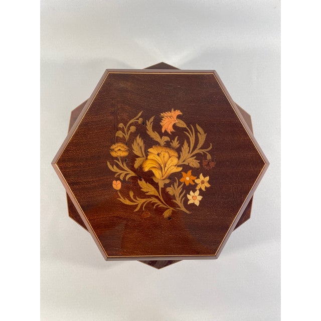 A gorgeous and rare shaped hexagon Italian Marquetry Musical Jewelry Box that plays the famous theme from the movie "Love...