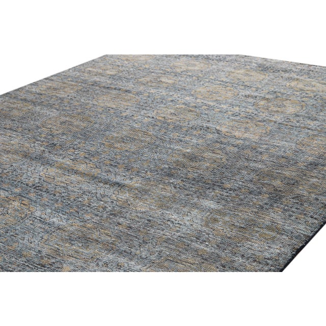 Beautiful Modern Soumak Style Distressed Indian Rug, hand-knotted wool with a blue field, dark yellow, and black accents...