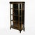 A fine example of French craftsmanship from the Napoleon III era, this black lacquer and brass display cabinet, circa...
