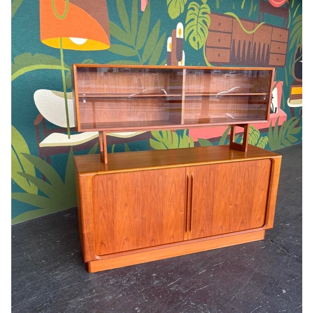 Classic Danish modern hutch to showcase your prized items, dishware, etc. Manufactured by Bernard Pedersen & Sons. Base...