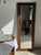 Mirror from an old wardrobe door, with an oak frame. The oak is a brown hue with a waxed patina. The rectangular, beveled...