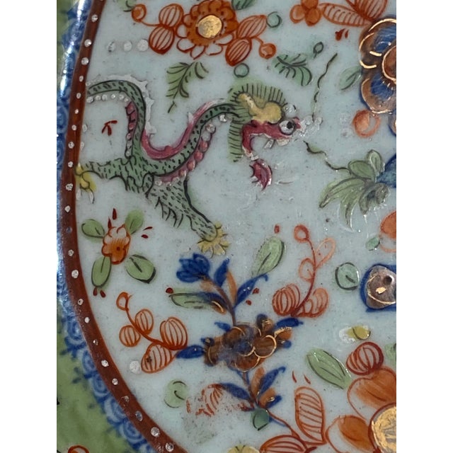 An 18th century Qing Dynasty clobbered plasterer with dragons and florals.