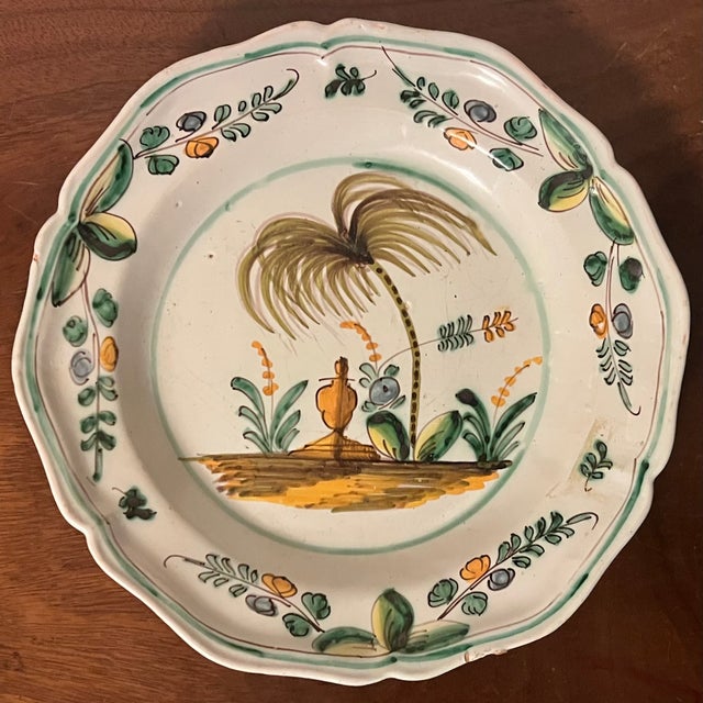 Antique early 19th century French faience pottery plate decorated with Mediterranean palm tree & urn garden landscape....