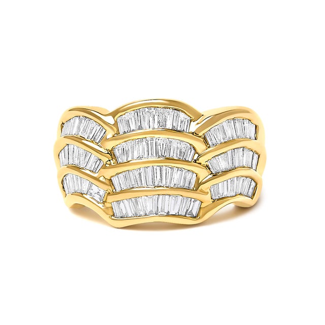Embrace the elegance of undulating seas translated beautifully into the 14K Yellow Gold Diamond Wave Design Band, where...