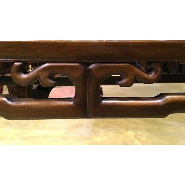 This elegant elmwood console is handcrafted and so the beautiful details under the top and to the corners, both the sides....