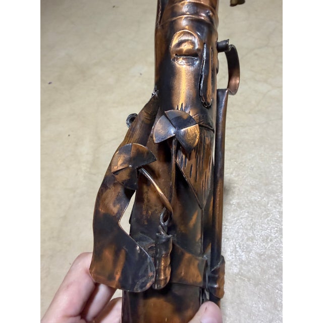 An exceptional mid-century brutalist copper sculpture representing Saint Patrick (or a Celtic bishop), hand-formed by...