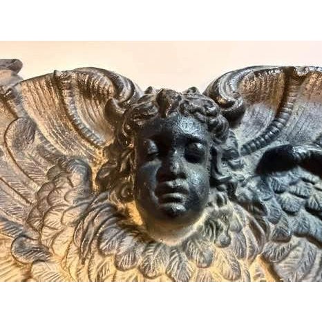 Antique Cast Iron Cherub Wall Plaque Hole on each side for wall mounting options. An exceptionally sculptural antique cast...