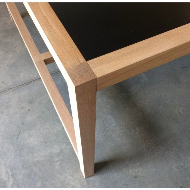 A beautifully crafted custom dining table that celebrates the beauty of honest materials and refined architectural design....