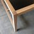 A beautifully crafted custom dining table that celebrates the beauty of honest materials and refined architectural design....
