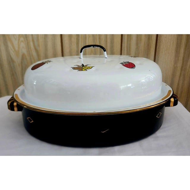 vintage 1960s Georges Briard covered roasting pan in the Ambrosia pattern, black and white enamel, painted fruit on the...