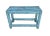 Rustic wood slatted bench painted a vivid blue with cross braces and solid construction. Cute little piece with lots of...