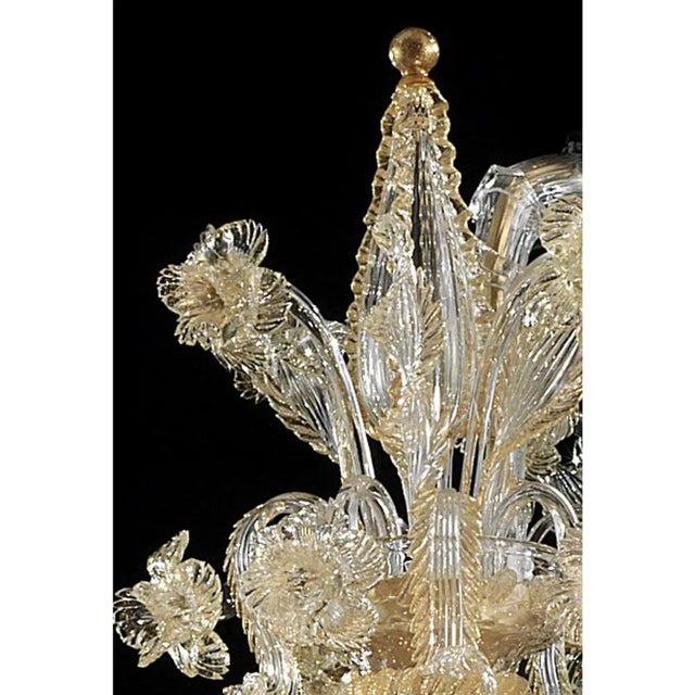 Traditional venetian "ca' rezzonico" murano glass wall sconce , full of hand-made details of blowing glass . full of gold-...