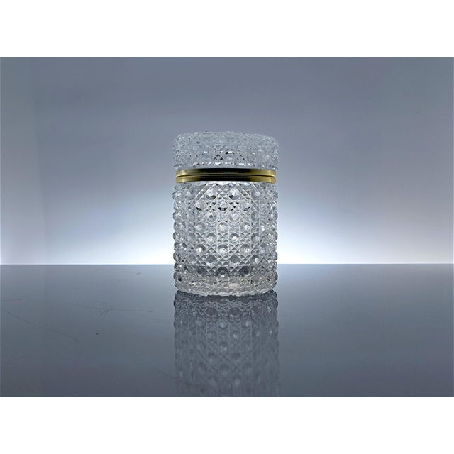 French-made crystal box, Baccarat style. It is made of high-quality cut crystal and features a gold-plated metal edge. It...