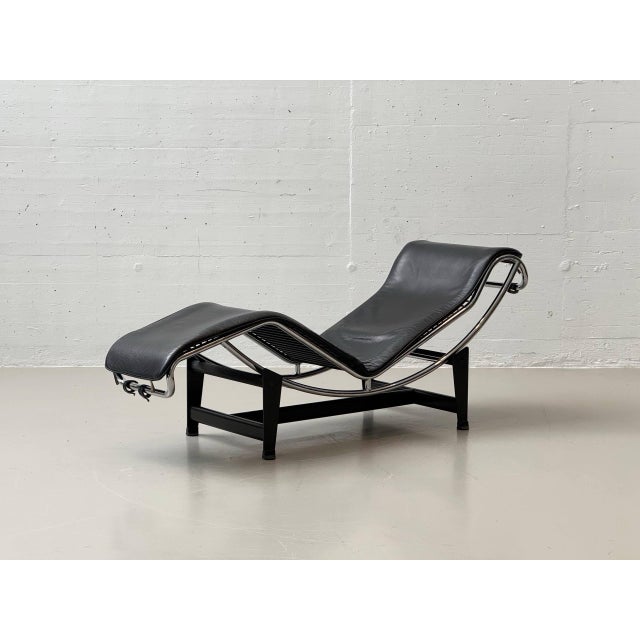 The iconic lc4 adjustable chaise longue by cassina, italy, is crafted in a classic design with a chrome-plated tubular...