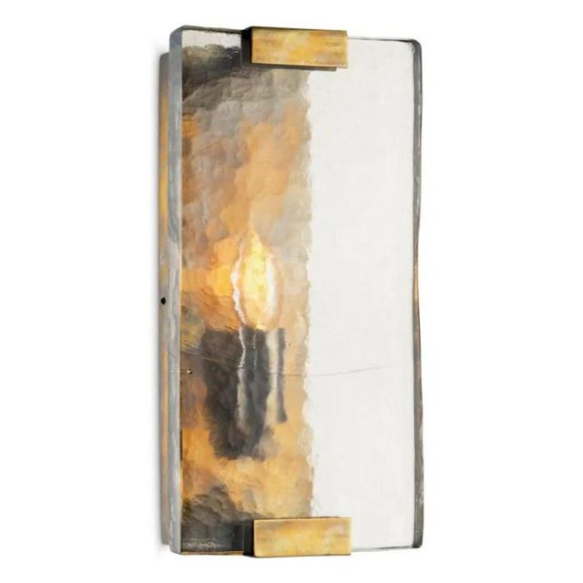 Pair of vintage brass wall lamp with a handblown glass plate, designed to provide a refined decorative light for...